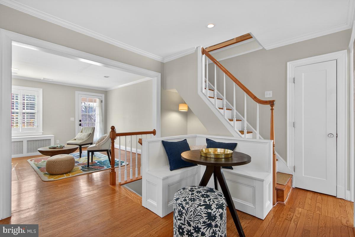 100 East Maple Street Alexandria, VA 22301 - Photo 12 of 114 a view of a livingroom with furniture wooden floor and windows