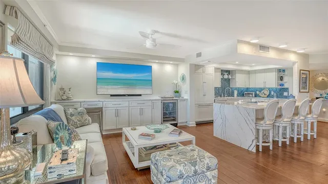 a bathroom with a granite countertop sink mirror and vanity