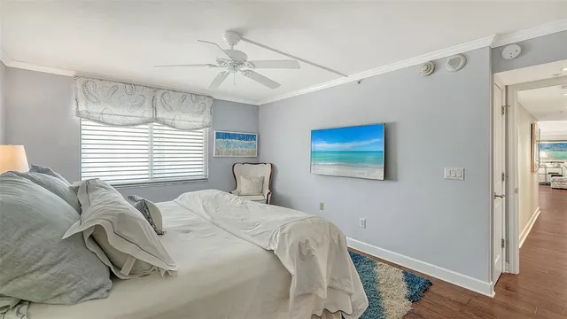 a view of a large building with a big yard and large trees