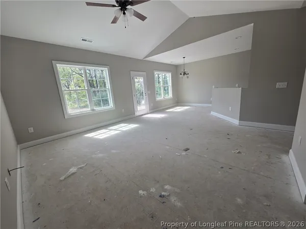 a view of a hallway with a chandelier