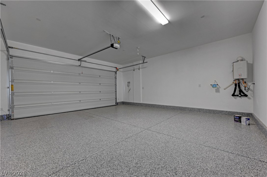 19 Strada Barbera Henderson, NV 89011 - Photo 44 of 53 Epoxy floor and tankless water heater.