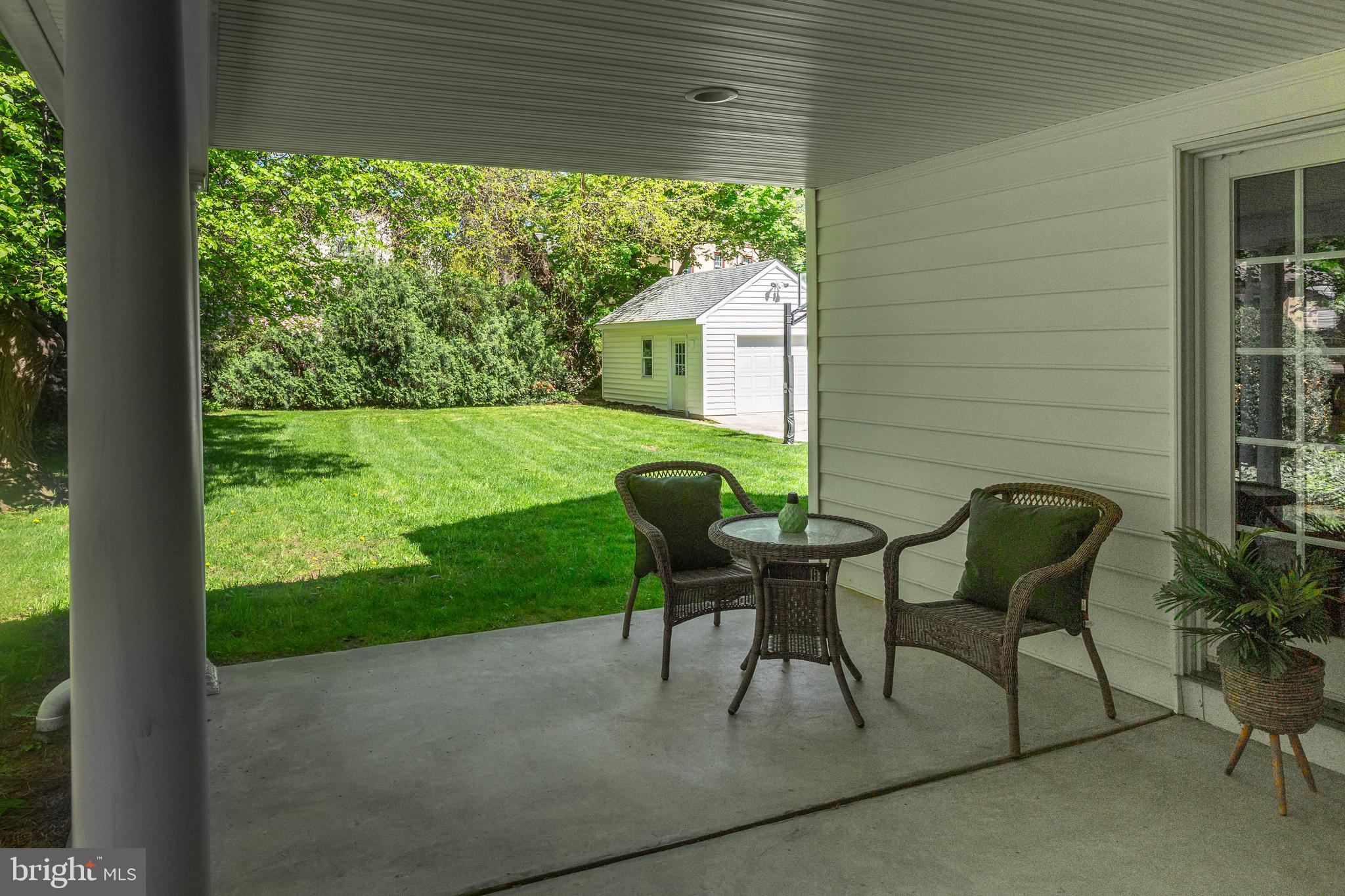 186 Lakeside Road Ardmore, PA 19003 - Photo 44 of 47 Rear Covered Porch Overlooking Green Backdrop!
