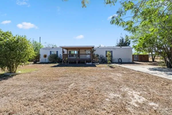 a house view with a garden space