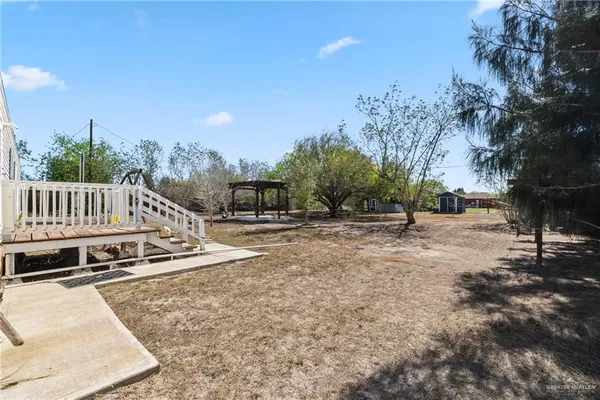 a view of a house with swimming pool
