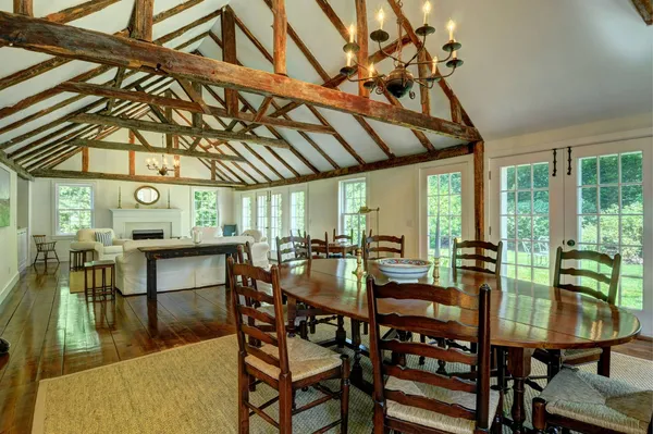a view of a dining room with furniture window and outside view