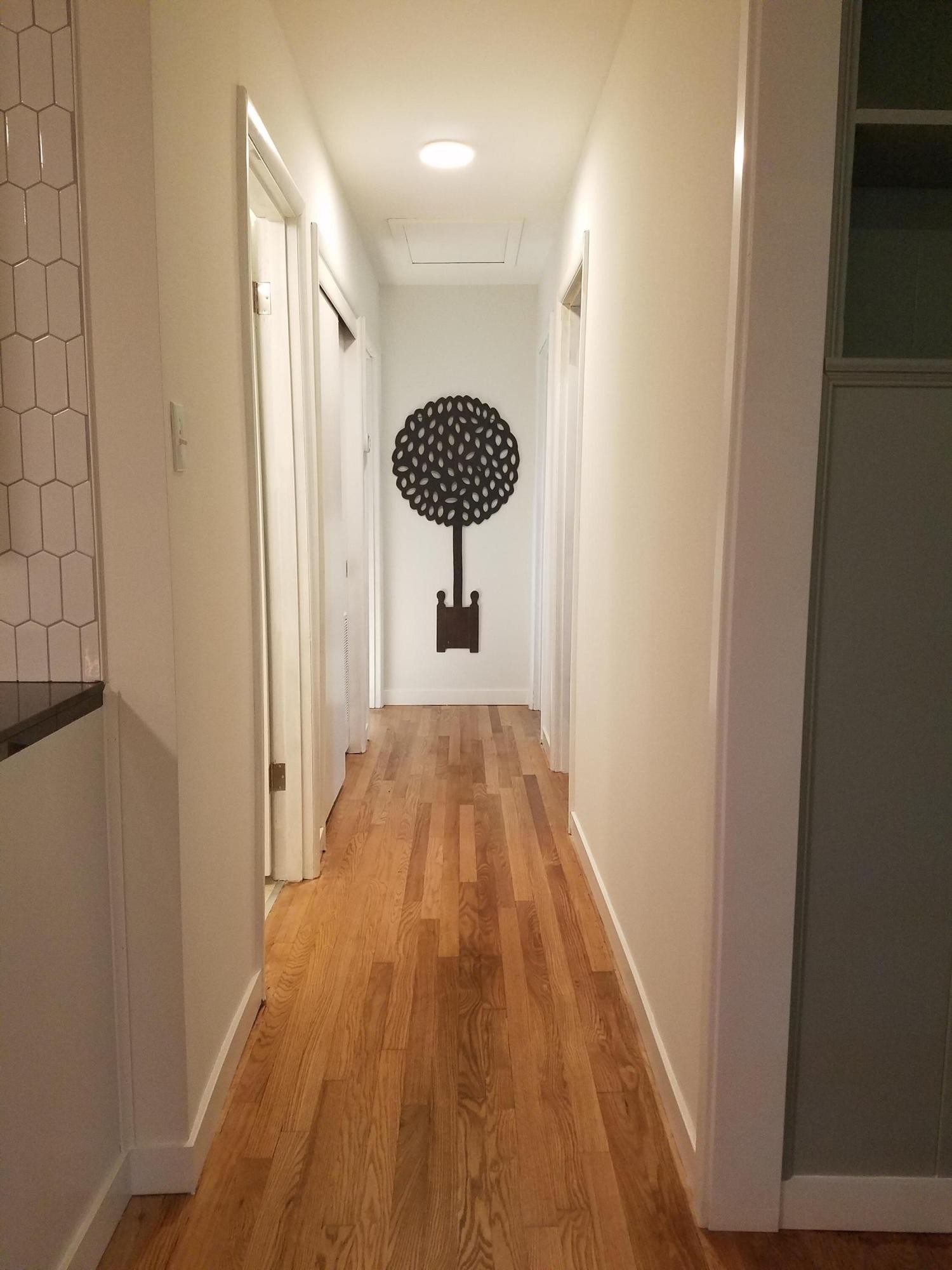 552 Foust Carney Road Powell, TN 37849 - Photo 17 of 35 a view of a hallway with a wooden floor