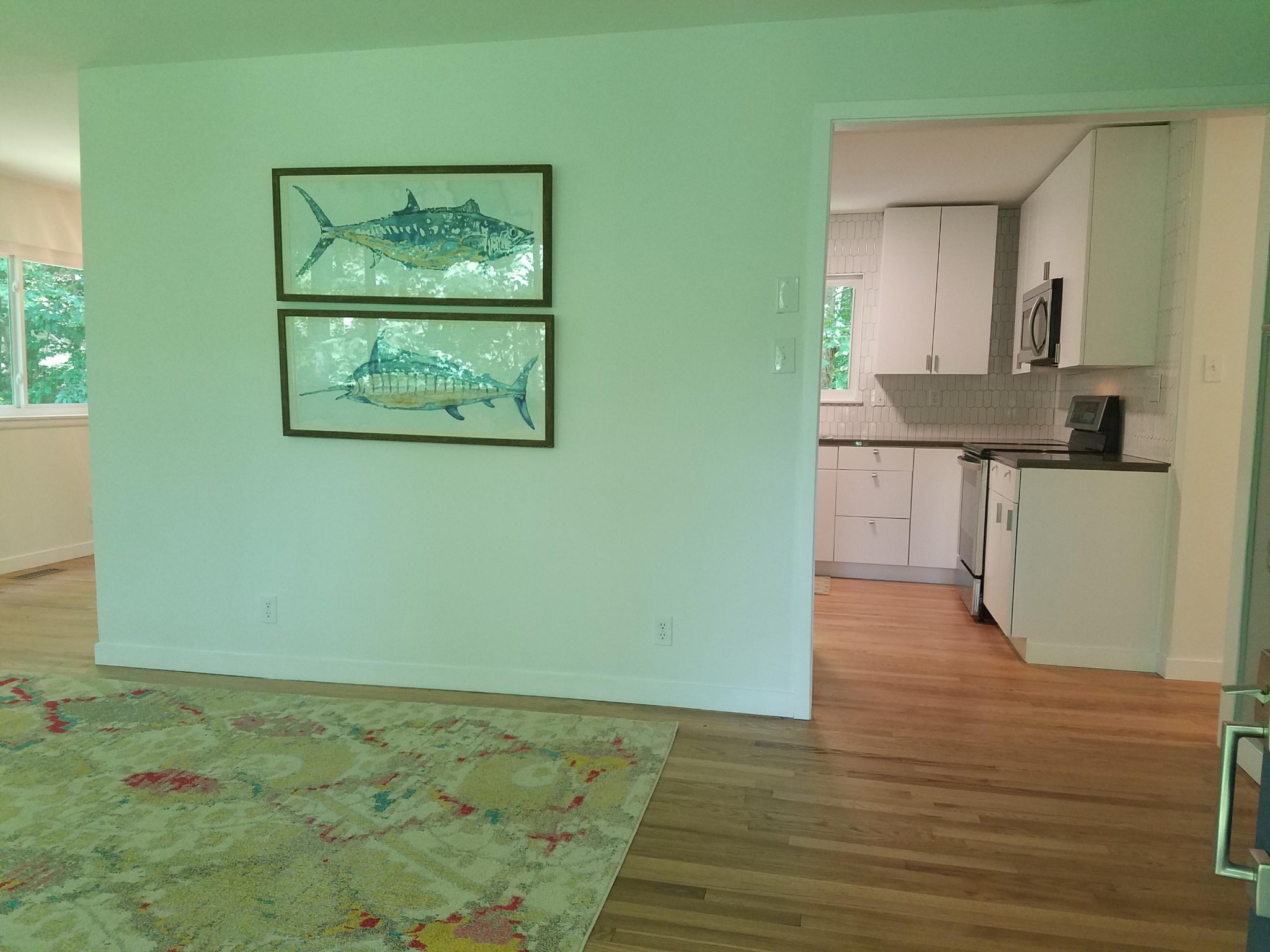 552 Foust Carney Road Powell, TN 37849 - Photo 6 of 35 an empty room with wooden floor and cabinet