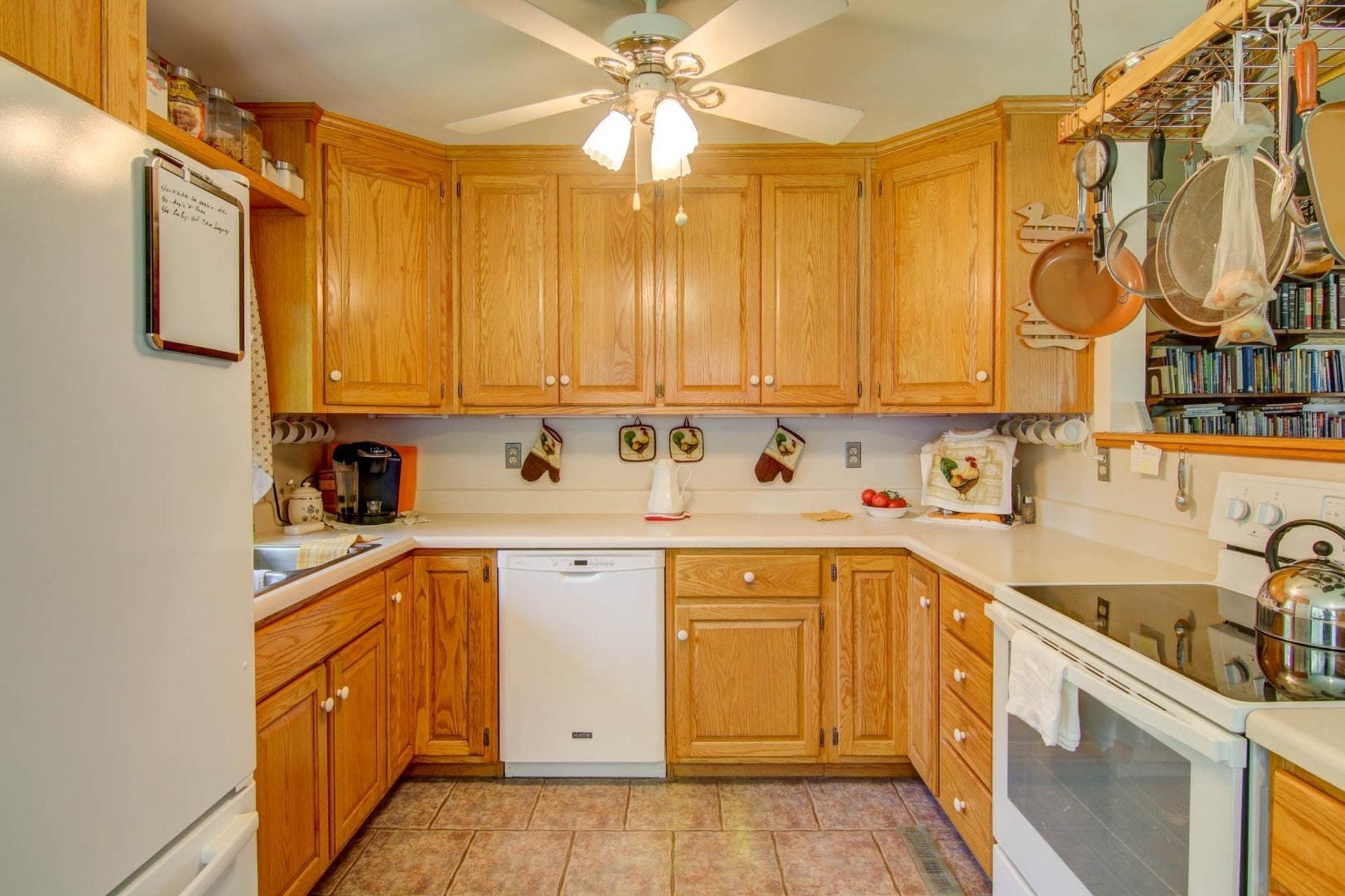 4682 Providence Church Road Ferrum, VA 24088 - Photo 13 of 43 a kitchen with a sink cabinets and window
