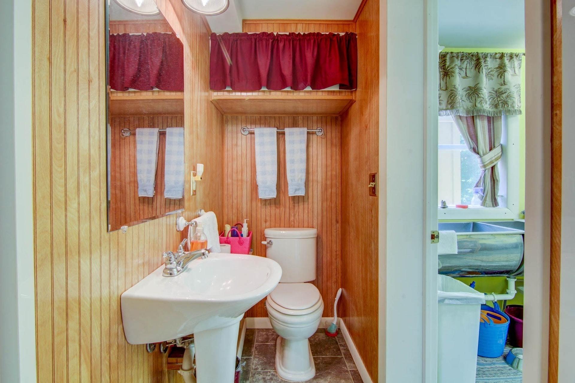4682 Providence Church Road Ferrum, VA 24088 - Photo 28 of 43 a bathroom with a sink and a mirror