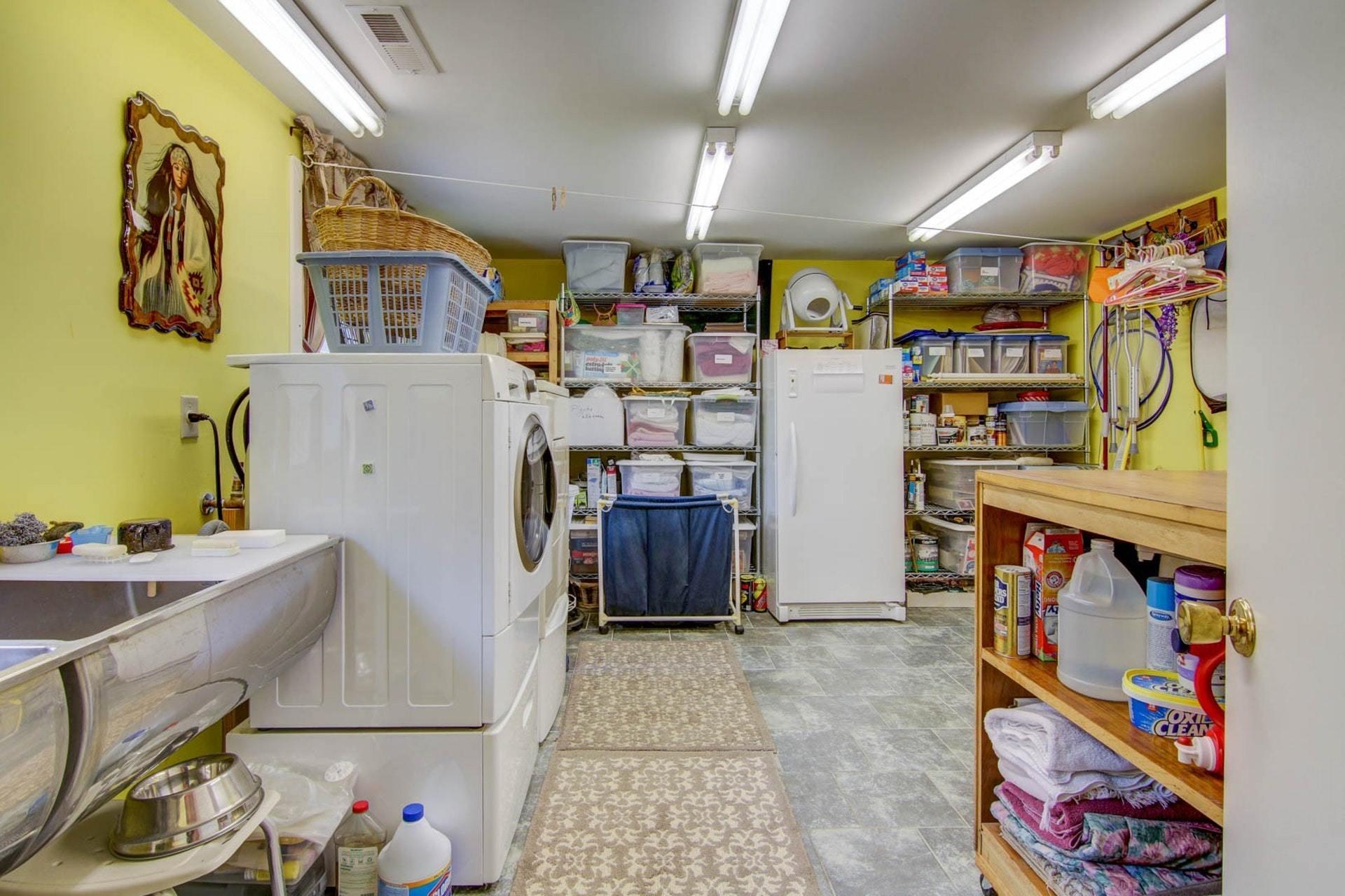 4682 Providence Church Road Ferrum, VA 24088 - Photo 29 of 43 a storage room with washer and dryer