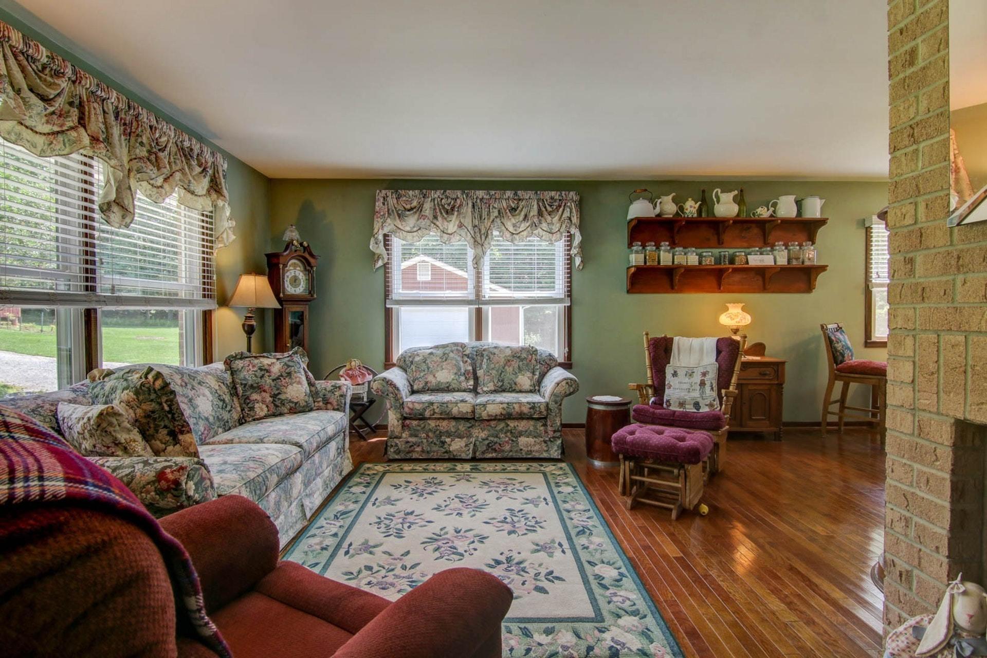 4682 Providence Church Road Ferrum, VA 24088 - Photo 9 of 43 a living room with furniture and a large window
