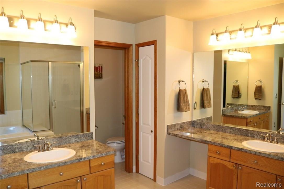1983 Blue Grass Court Rochester, MI 48306 - Photo 26 of 46 DOUBLE SINKS AND A PRIVATE TOILET AREA