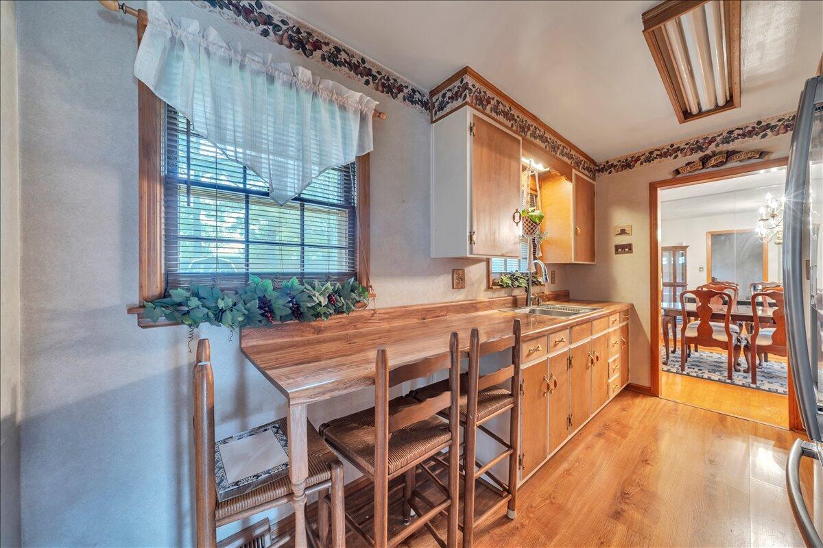 1525 West Ruritan Road Roanoke, VA 24012 - Photo 13 of 62 a spacious bathroom with a granite countertop sink and a large mirror