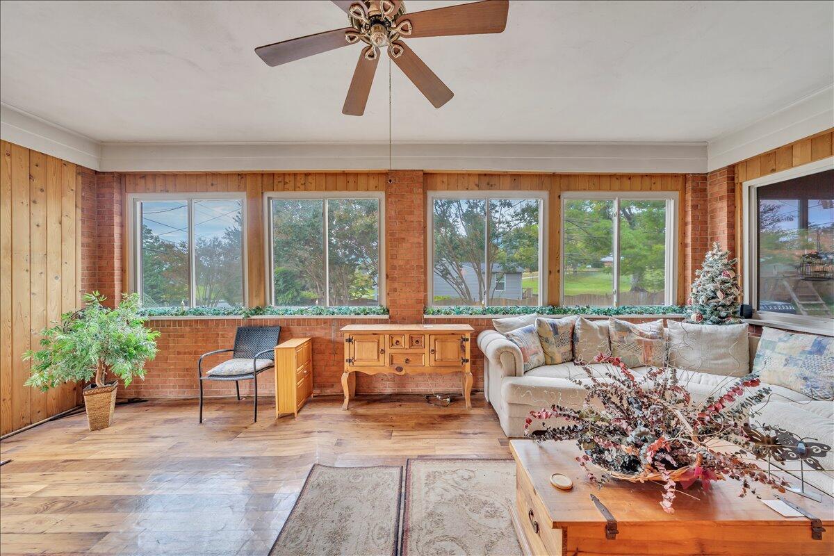 1525 West Ruritan Road Roanoke, VA 24012 - Photo 16 of 62 a living room filled with furniture and a large window