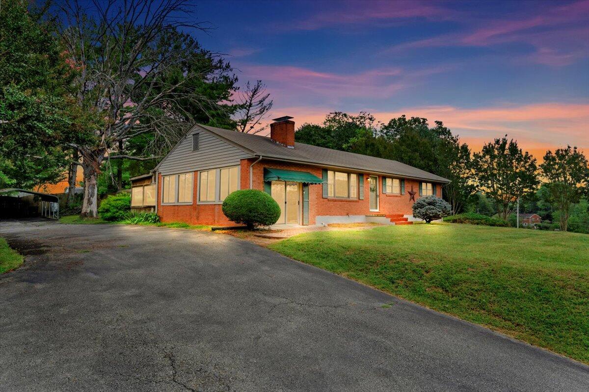 1525 West Ruritan Road Roanoke, VA 24012 - Photo 2 of 62 a view of a house with backyard and garden