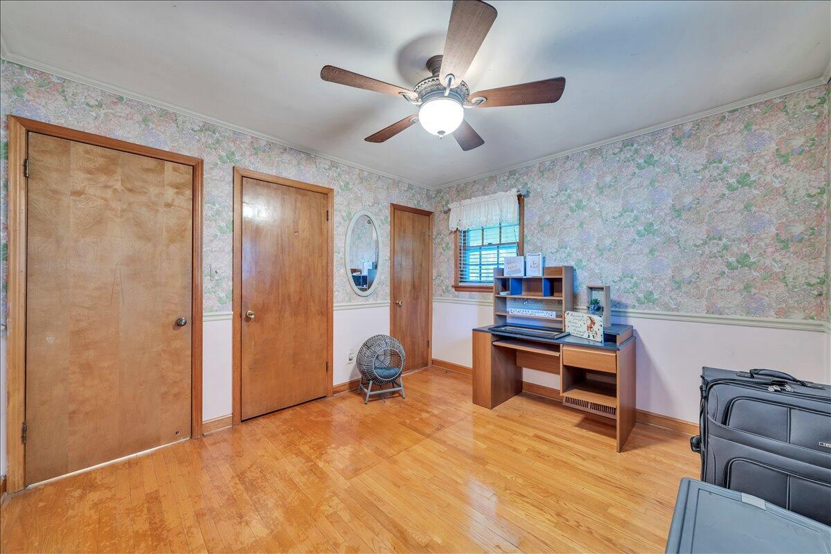 1525 West Ruritan Road Roanoke, VA 24012 - Photo 24 of 62 a living room with furniture and a wooden floor