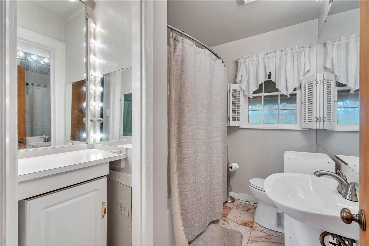 1525 West Ruritan Road Roanoke, VA 24012 - Photo 26 of 62 a bathroom with a sink toilet and shower