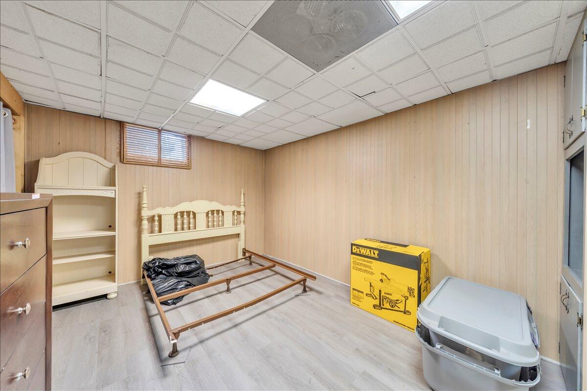 1525 West Ruritan Road Roanoke, VA 24012 - Photo 37 of 62 a living room with a bed furniture and a window