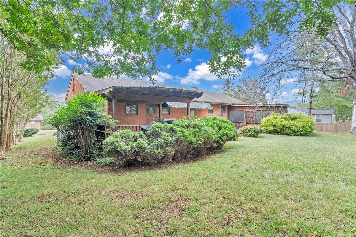1525 West Ruritan Road Roanoke, VA 24012 - Photo 47 of 62 a view of a house with a garden