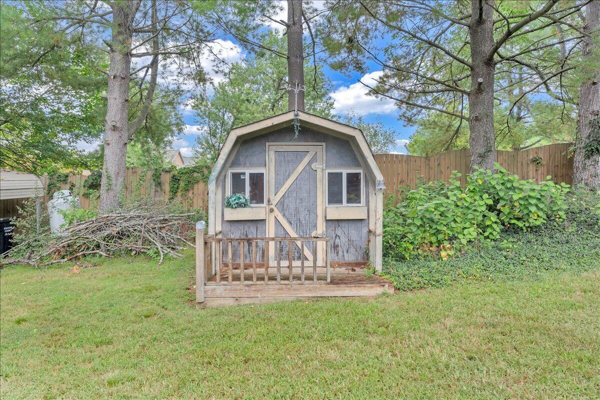 1525 West Ruritan Road Roanoke, VA 24012 - Photo 48 of 62 a view of a house with a yard