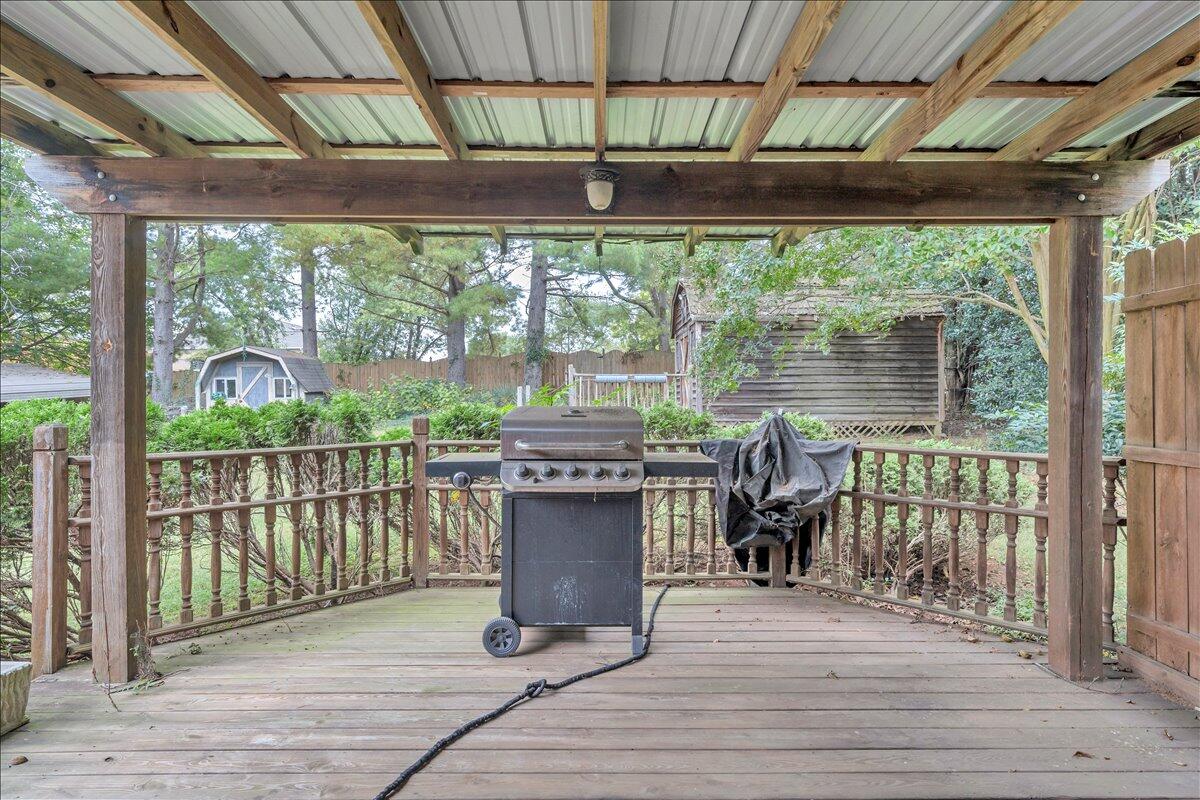 1525 West Ruritan Road Roanoke, VA 24012 - Photo 52 of 62 a view of a deck with wooden floor chairs and a table