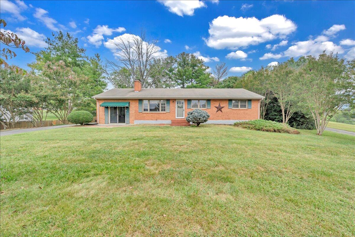 1525 West Ruritan Road Roanoke, VA 24012 - Photo 57 of 62 a view of house with yard and green space