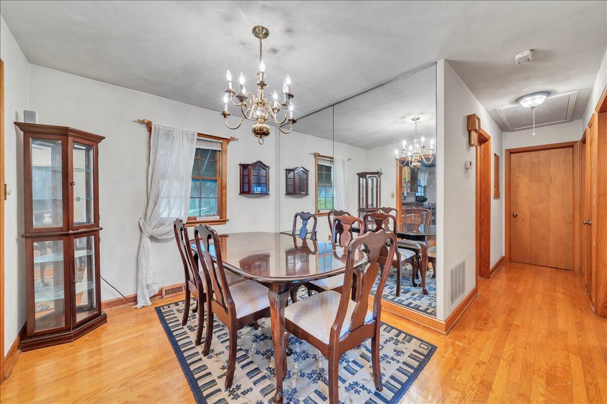 1525 West Ruritan Road Roanoke, VA 24012 - Photo 9 of 62 a view of a dining room with furniture and chandelier