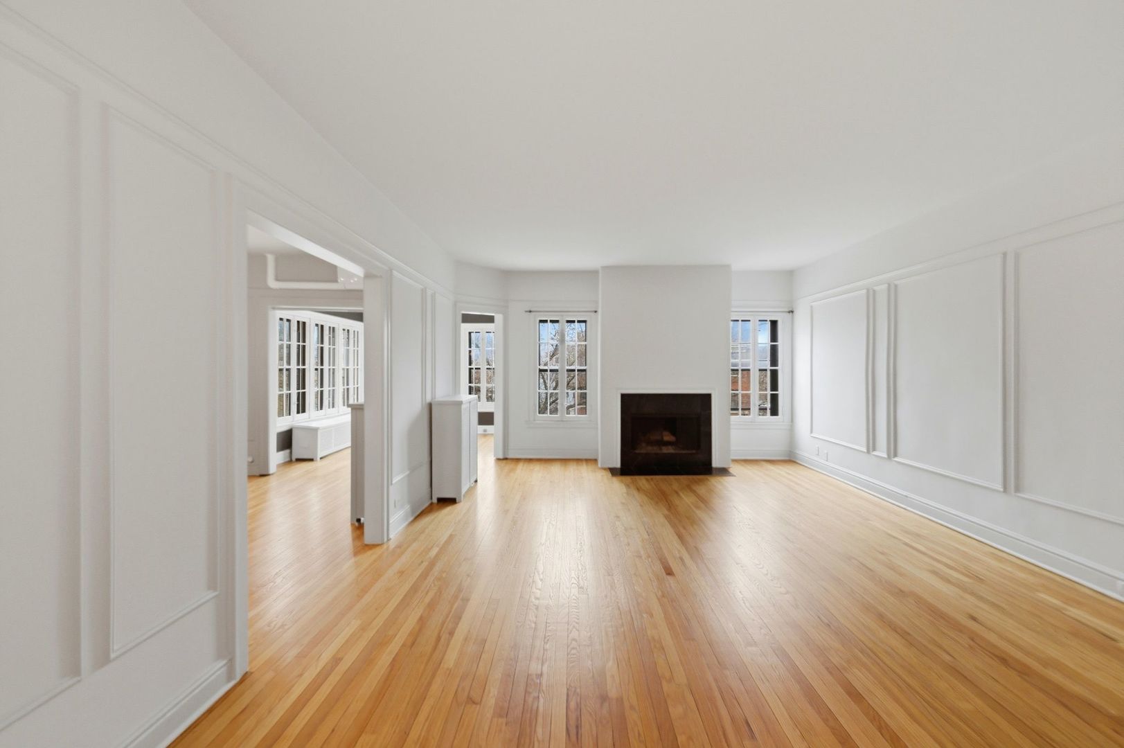 540 Sheridan Road, Unit 3 Evanston, IL 60202 - Photo 8 of 25 a view of a living room with furniture and wooden floor