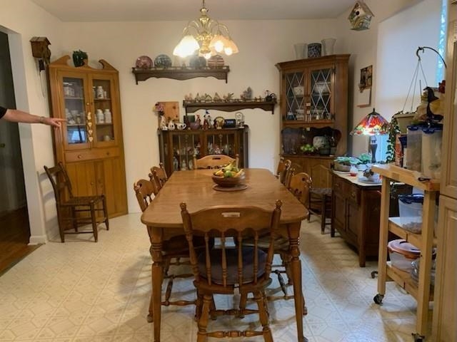 175 Highlands Court Monterey, VA 24465 - Photo 11 of 31 a view of a dining room with furniture and chandelier