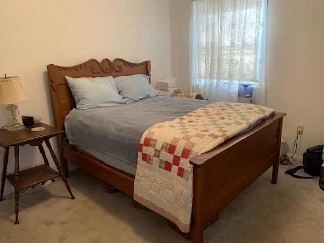 175 Highlands Court Monterey, VA 24465 - Photo 17 of 31 a bedroom with a bed and a stool