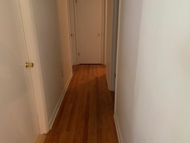 175 Highlands Court Monterey, VA 24465 - Photo 26 of 31 a view of a hallway with wooden floor