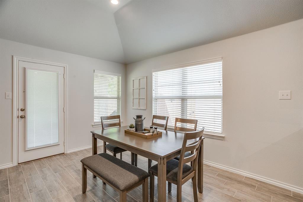 9912 Mescalbean Boulevard Crowley, TX 76036 - Photo 11 of 23 a view of a workspace with furniture and window
