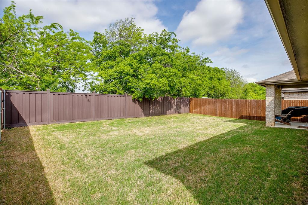 9912 Mescalbean Boulevard Crowley, TX 76036 - Photo 21 of 23 a view of outdoor space and yard