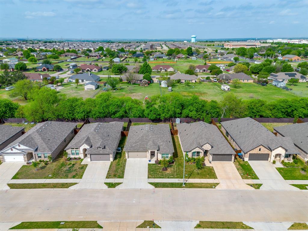 9912 Mescalbean Boulevard Crowley, TX 76036 - Photo 4 of 23 an aerial view of a house with garden space and street view