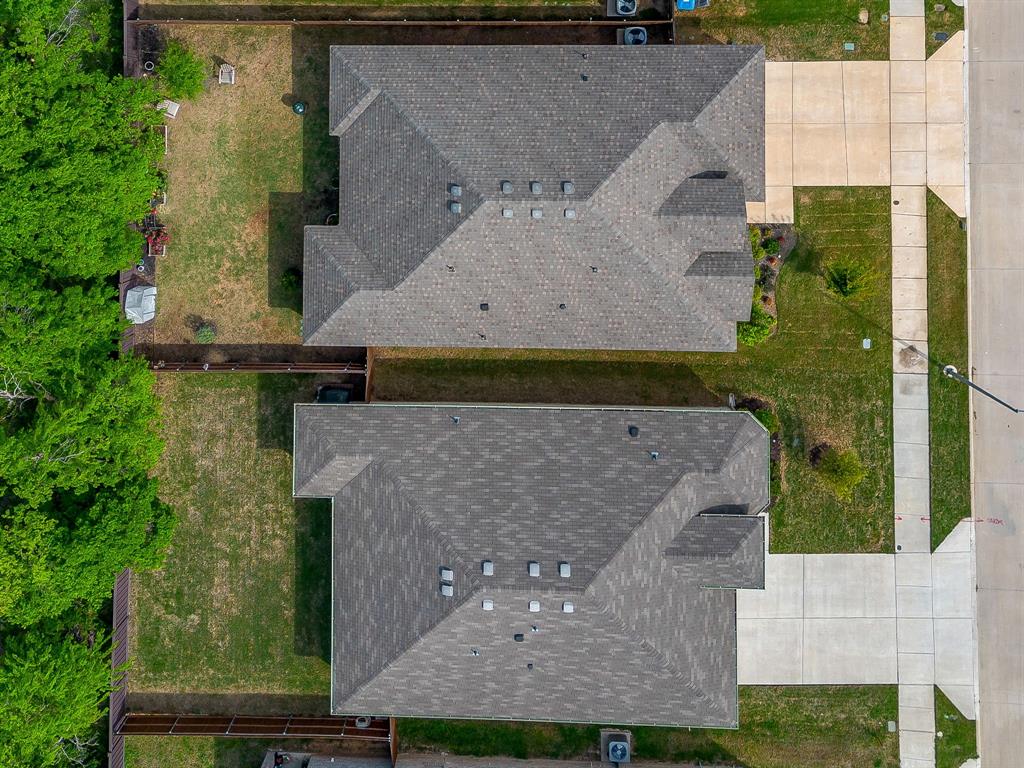 9912 Mescalbean Boulevard Crowley, TX 76036 - Photo 6 of 23 an aerial view of a house with a yard