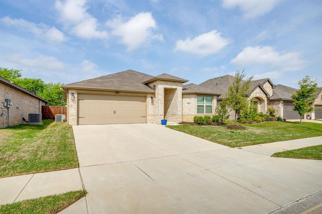 9912 Mescalbean Boulevard Crowley, TX 76036 - Photo 7 of 23 a view of house with yard and entertaining space