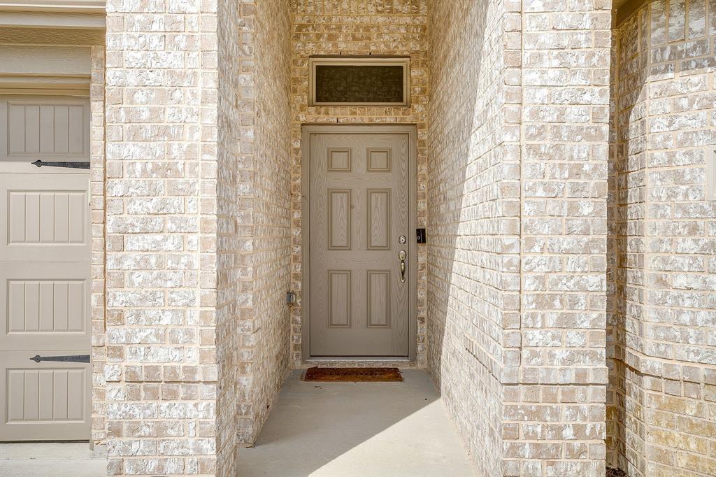 9912 Mescalbean Boulevard Crowley, TX 76036 - Photo 8 of 23 a view of a door of the house
