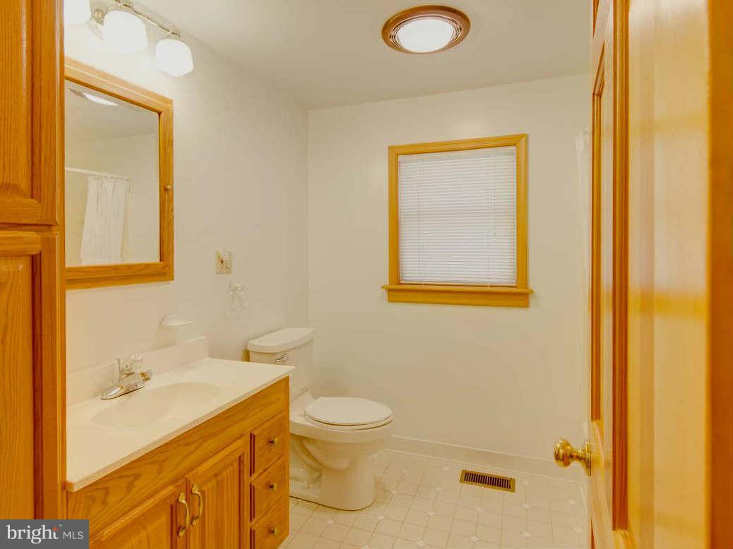 478 Edgewater Road Pasadena, MD 21122 - Photo 19 of 22 Remodeled Hall Bath