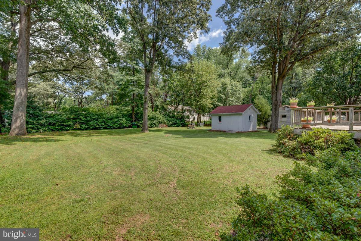 1/2 acre with large rear yard