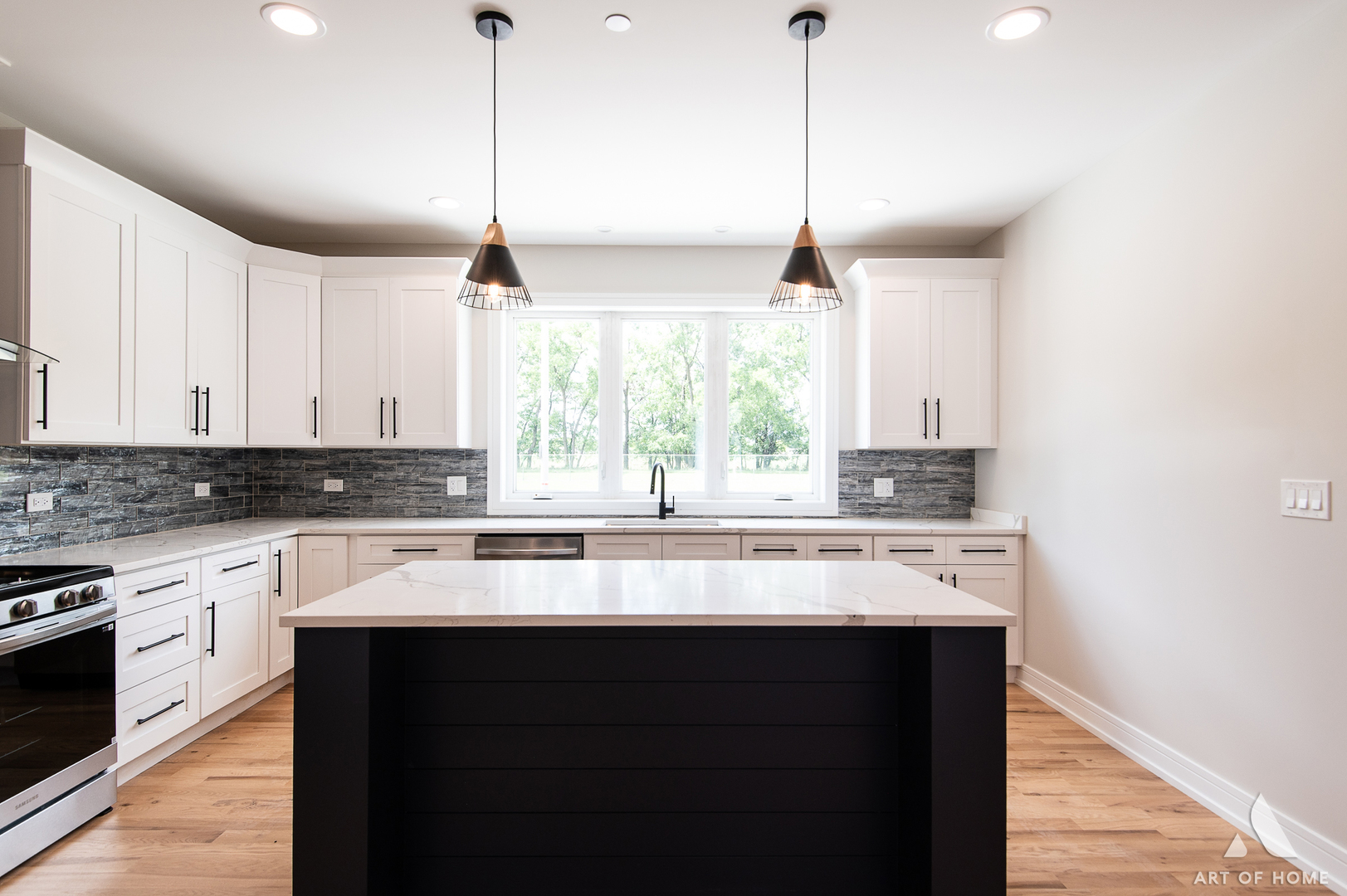 7957 West 73rd Place Bridgeview, IL 60455 - Photo 12 of 40 a kitchen with stainless steel appliances granite countertop a sink a window and cabinets