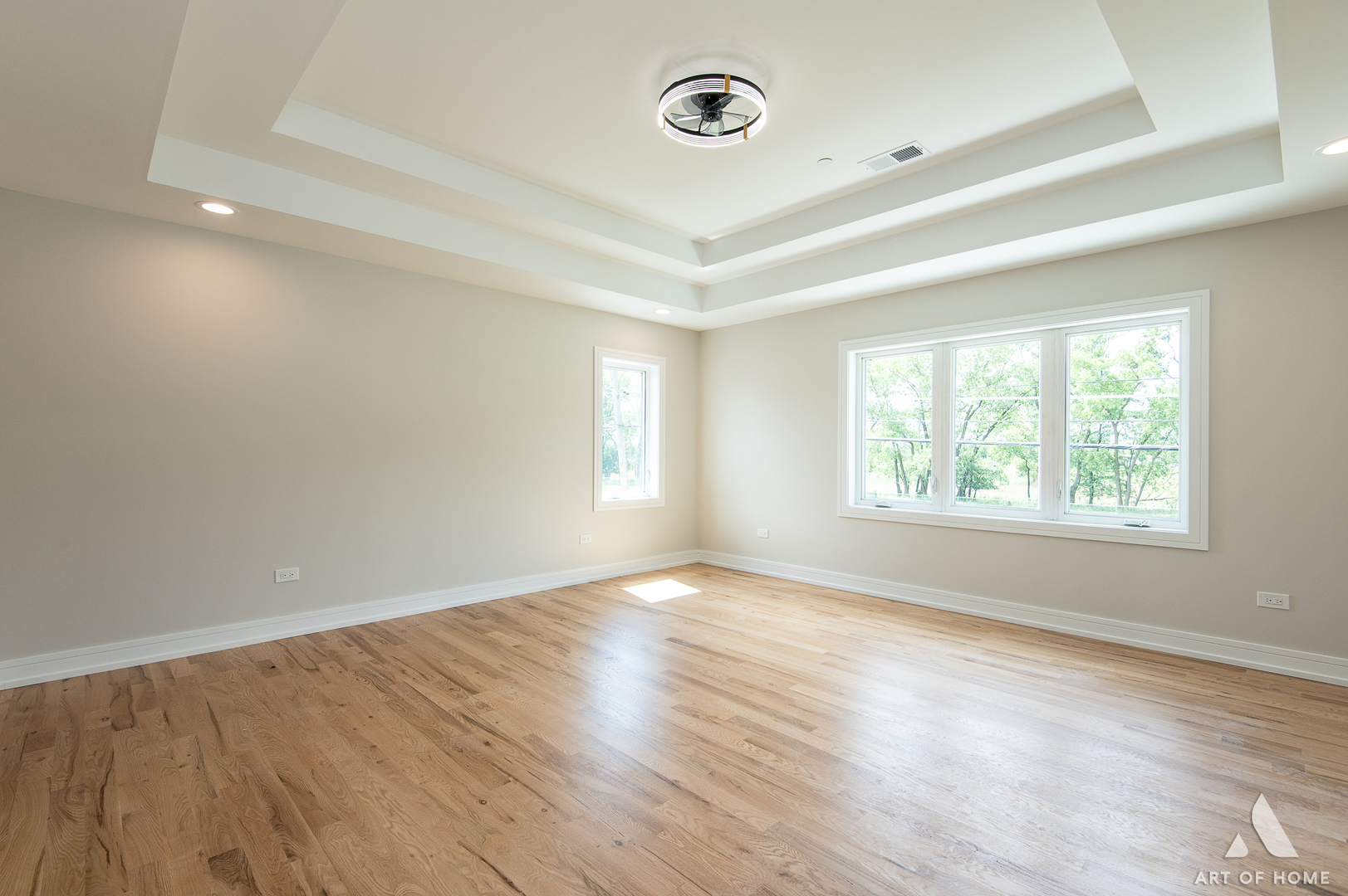 7957 West 73rd Place Bridgeview, IL 60455 - Photo 18 of 40 an empty room with wooden floor and windows