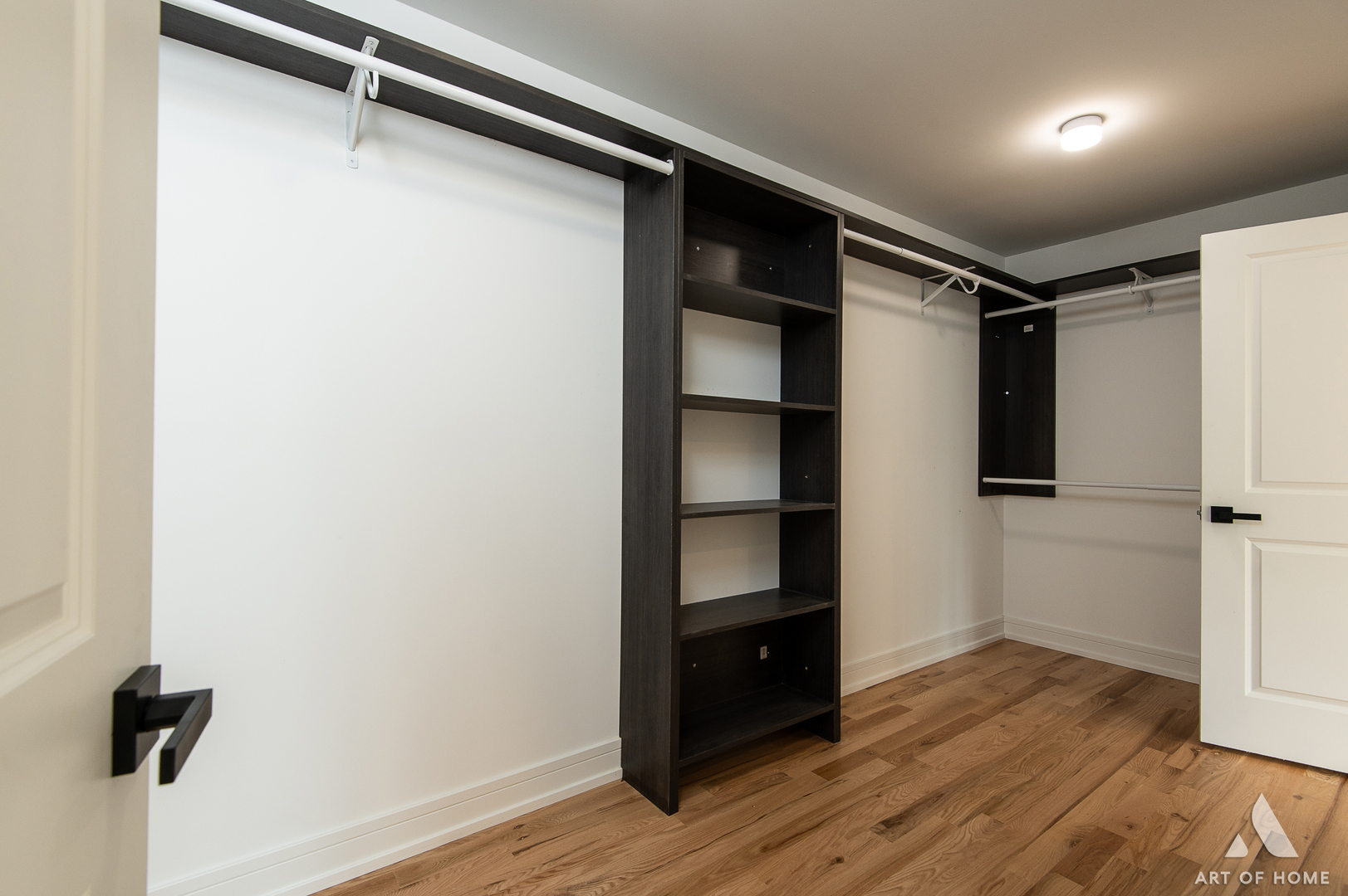 7957 West 73rd Place Bridgeview, IL 60455 - Photo 24 of 40 a view of walk in closet with empty racks