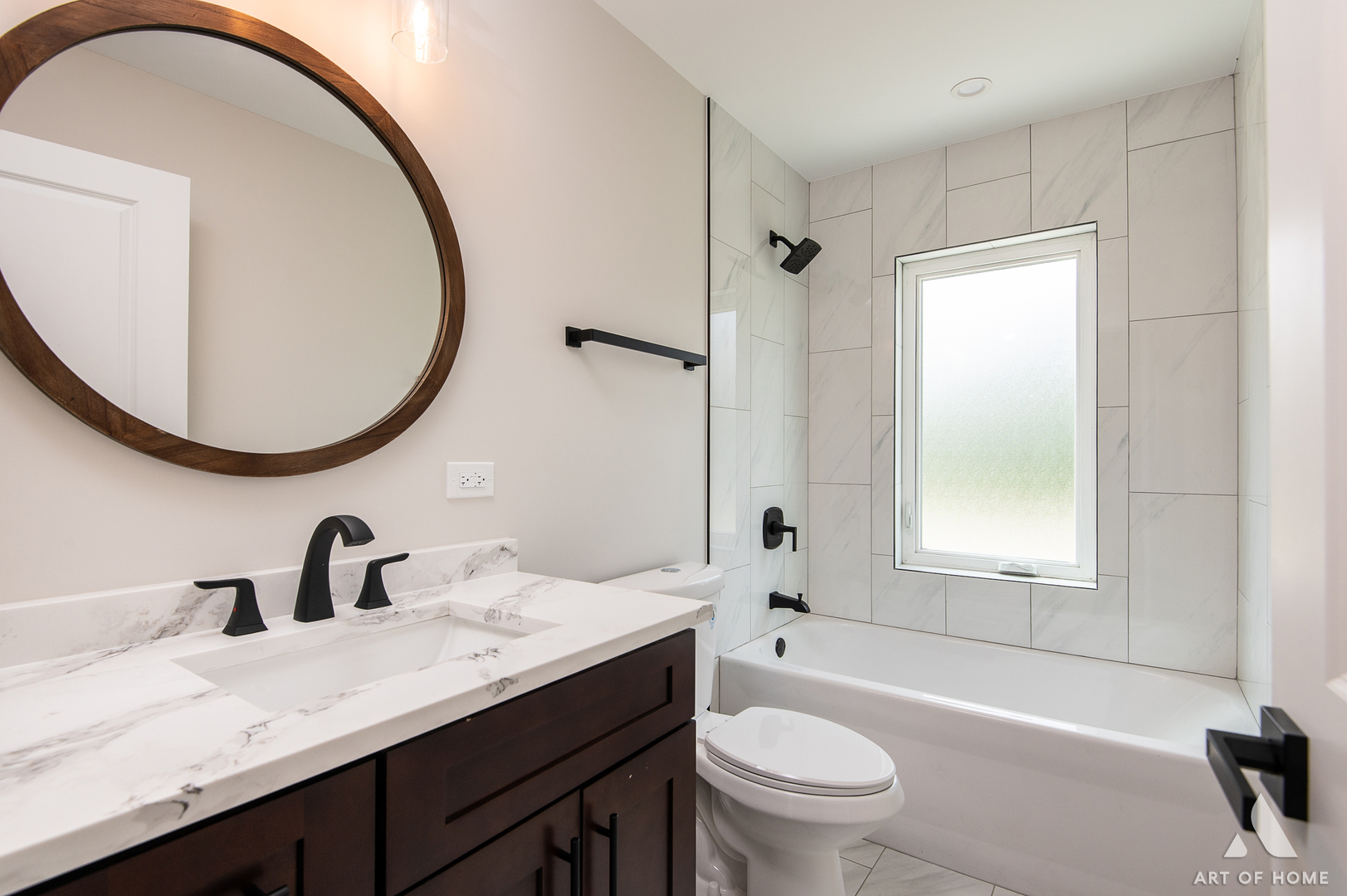 7957 West 73rd Place Bridgeview, IL 60455 - Photo 32 of 40 a bathroom with a sink a toilet and a mirror