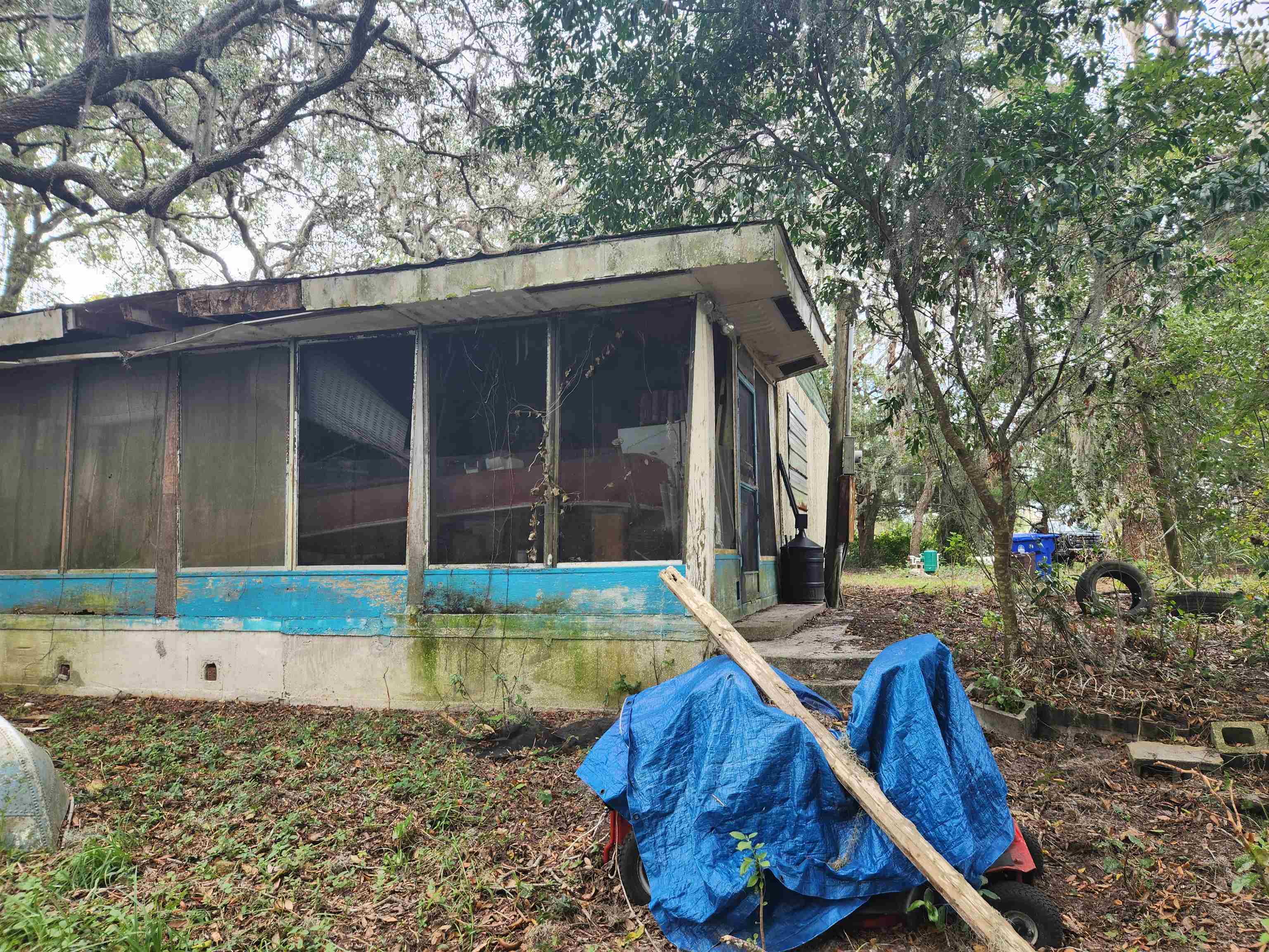 2890 Old Moultrie Road St. Augustine, FL 32086 - Photo 8 of 18 a backyard of a house with seating space