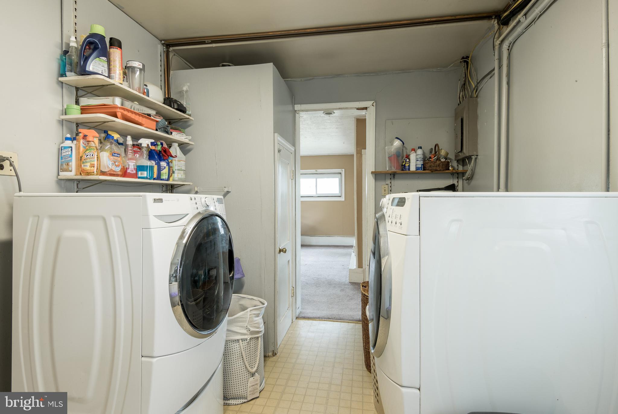 3629 Forest Hill Road Baltimore, MD 21207 - Photo 13 of 39 The laundry room is huge with space for storage.