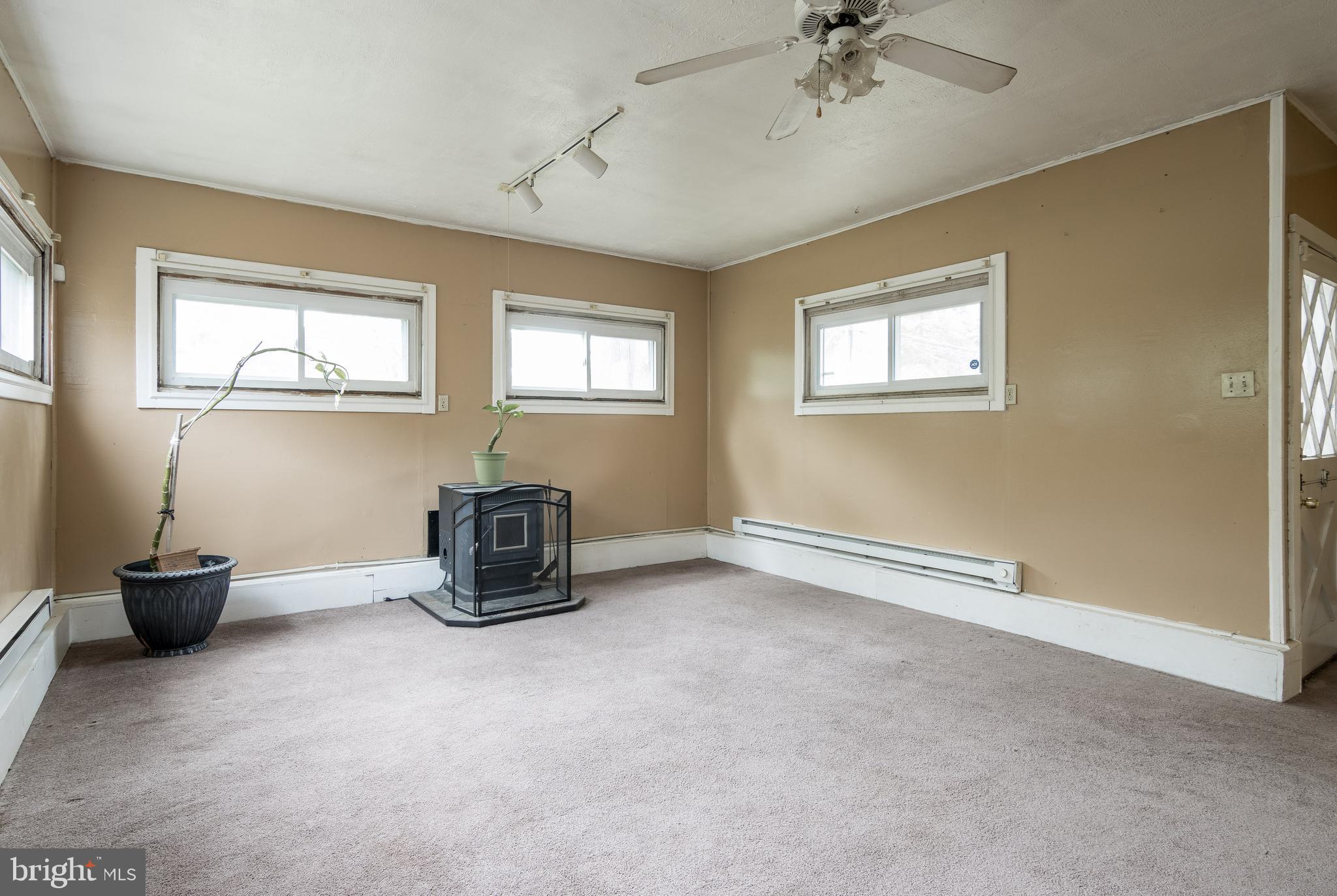 3629 Forest Hill Road Baltimore, MD 21207 - Photo 16 of 39 A great space with the extra pellet stove.