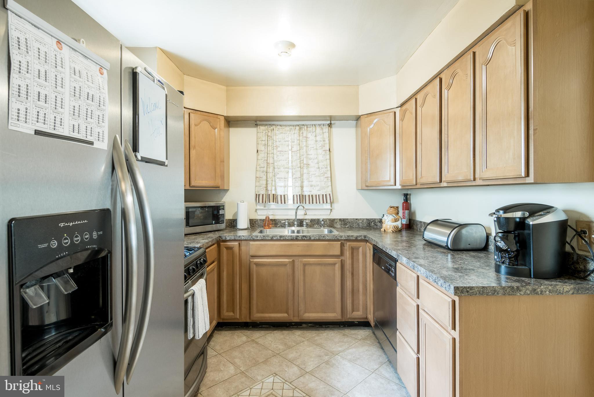 3629 Forest Hill Road Baltimore, MD 21207 - Photo 10 of 39 Updated cabinets, counters & stainless steel appls