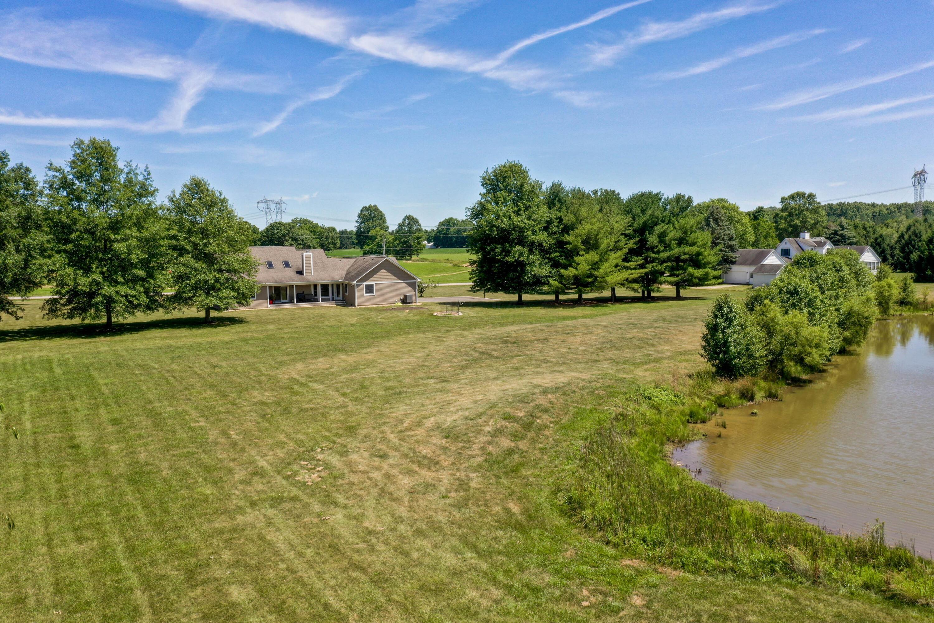 2828 Rome Corners Road Galena, OH 43021 - Photo 59 of 66 VIEW OF HOME FROM POND