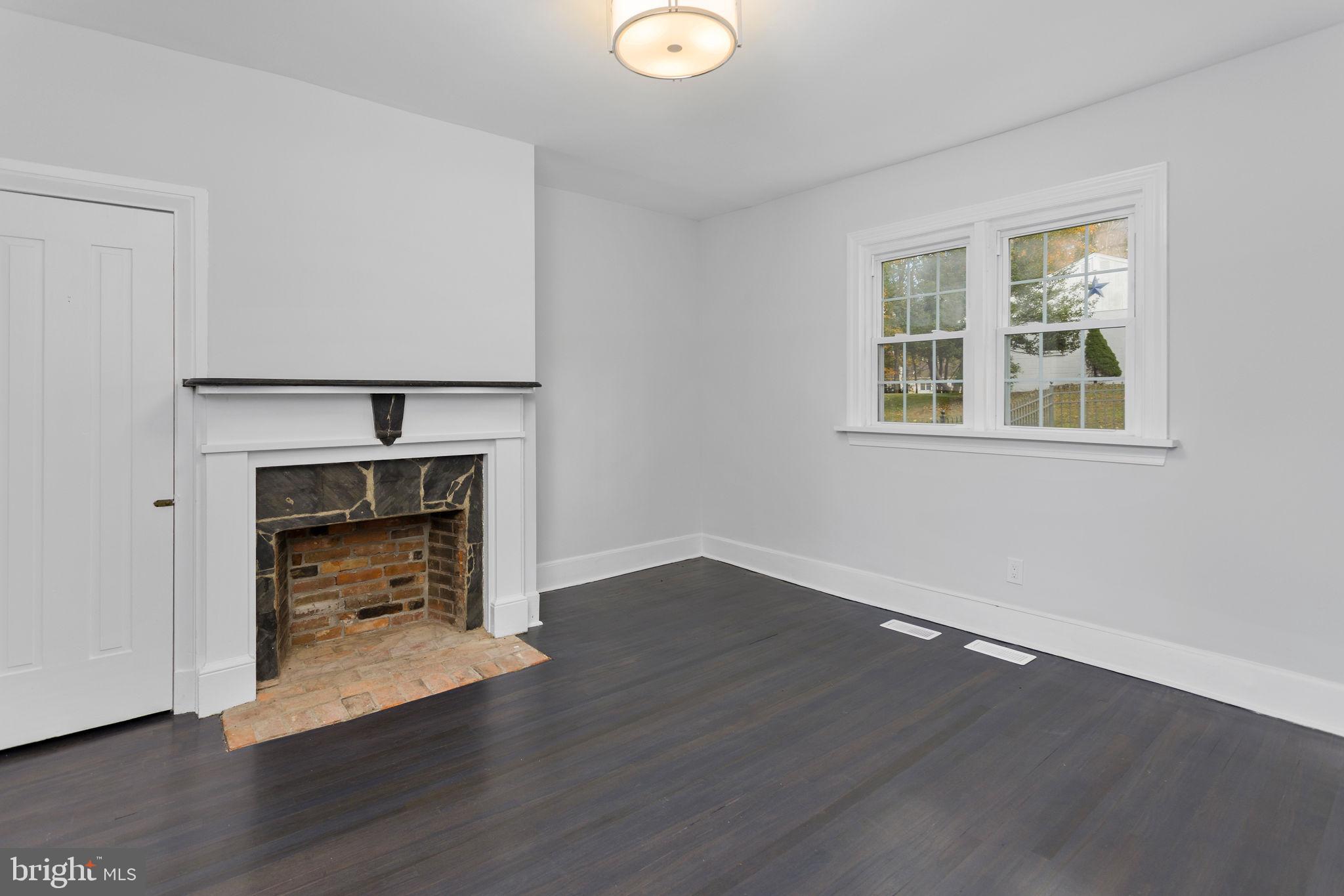 36 Chest-Georgetown Road Columbus, NJ 08022 - Photo 15 of 60 a view of an empty room with wooden floor and a window
