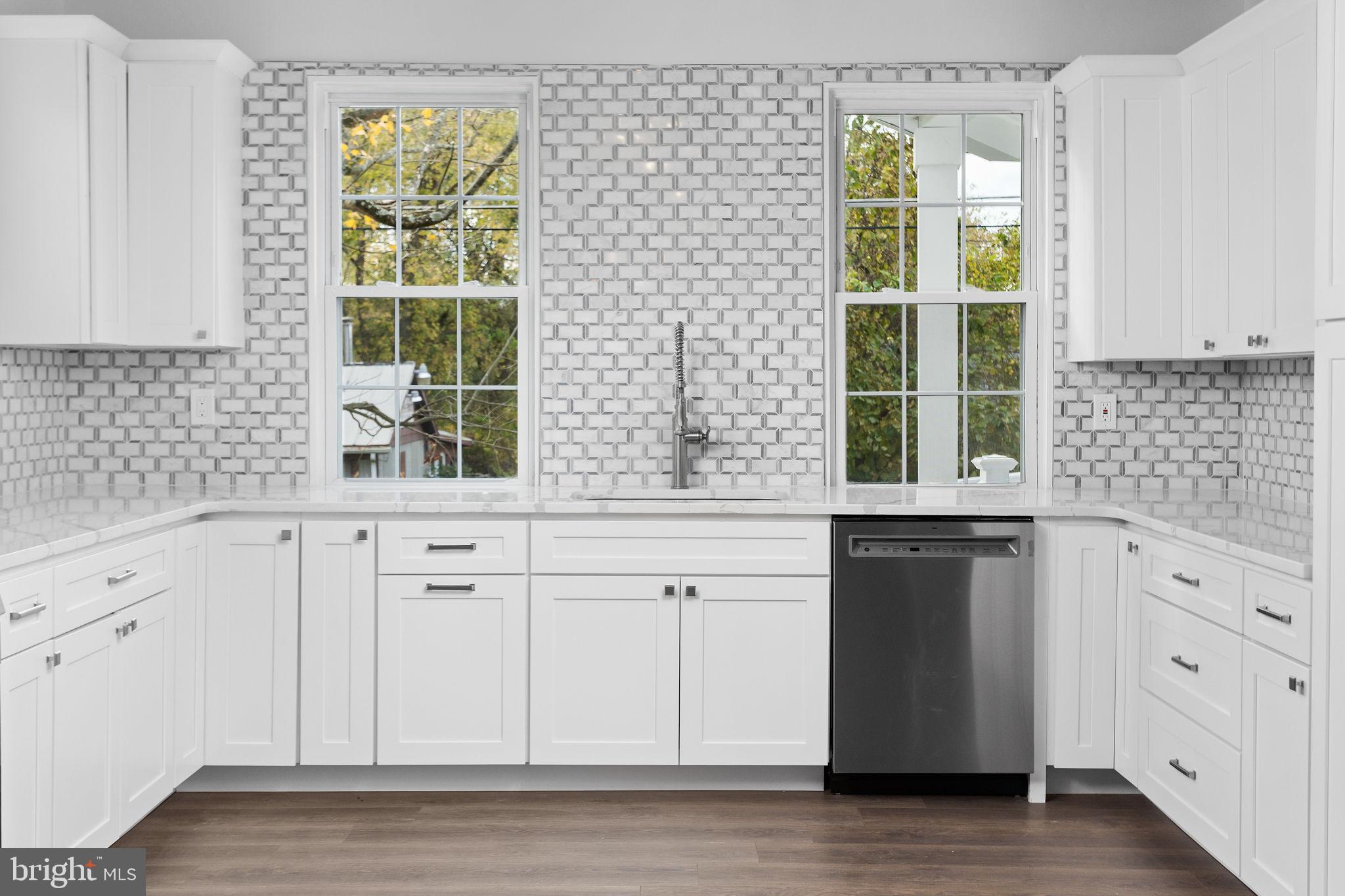 36 Chest-Georgetown Road Columbus, NJ 08022 - Photo 24 of 60 a kitchen with granite countertop white cabinets and a window